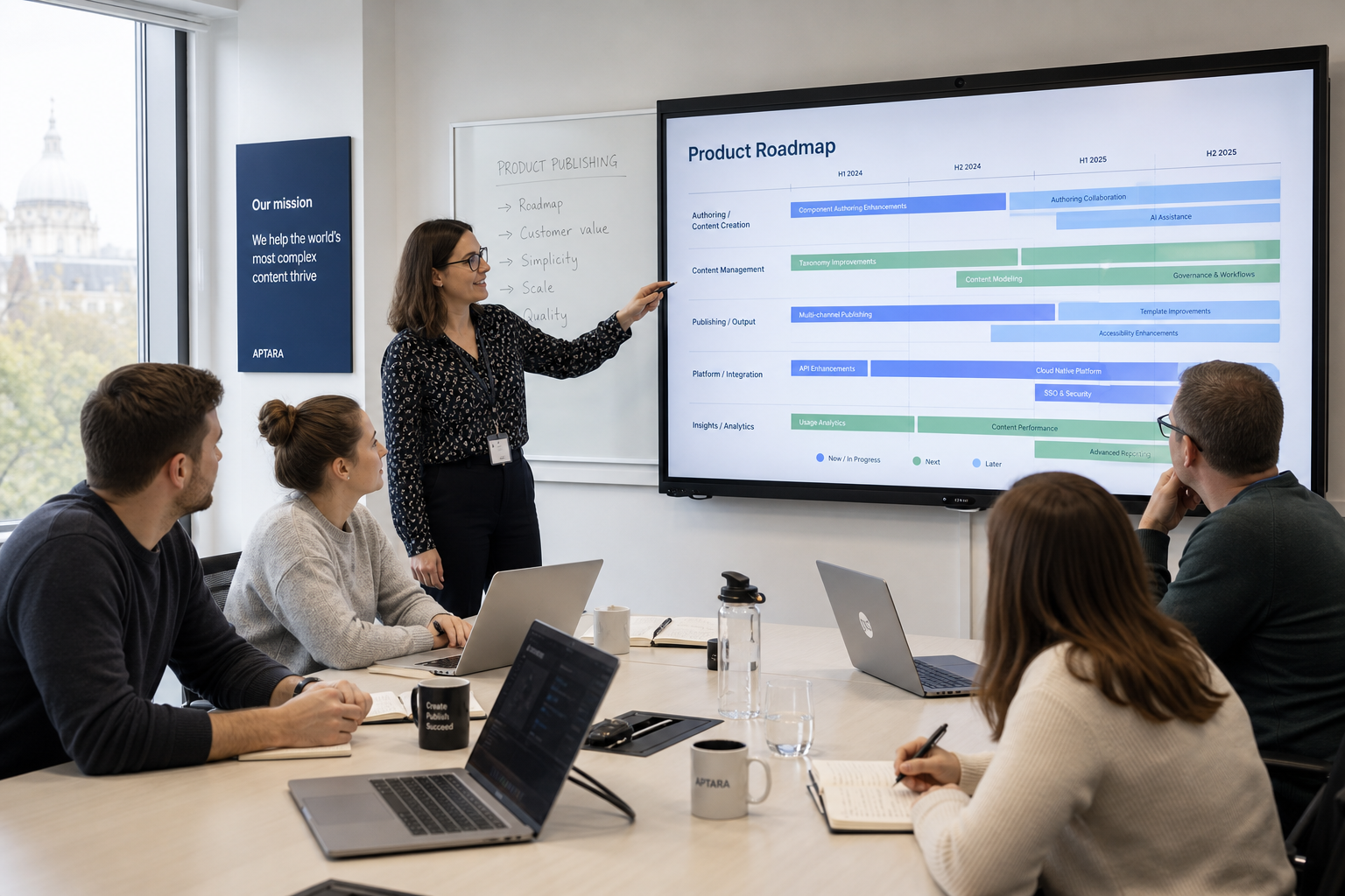 KLOP LTD team reviewing product roadmap in a bright seminar room